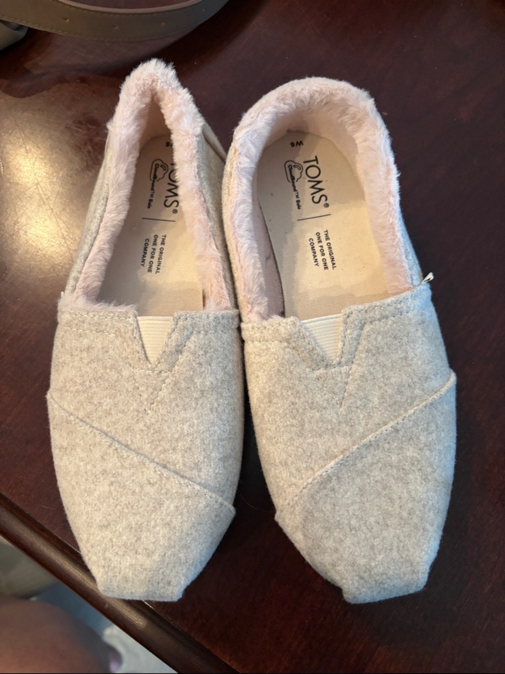 TOMS Women's Slip-On Moccasins in Light Gray with Pink Faux-Fur Lining